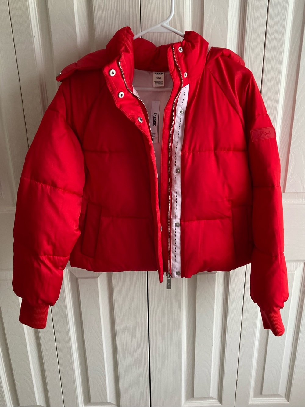Red puffer coat